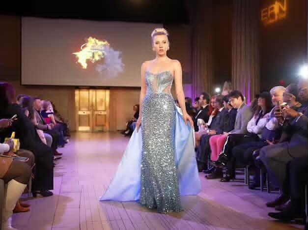 Nina Samira walking runway in blue gown at fashion show New York Fashion Week model catwalk